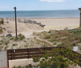 Les pieds dans le sable